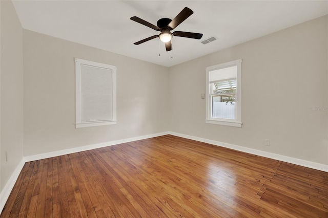 508 10th St, Saint Cloud, FL 34769 - spare room featuring wood-type flooring and a ceiling fan