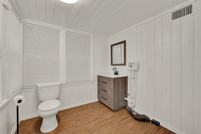508 10th St, Saint Cloud, FL 34769 - bathroom with vanity, wood finished floors, and wood ceiling