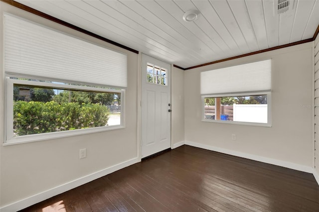 508 10th St, Saint Cloud, FL 34769 - entrance foyer featuring dark wood-style floors and wooden ceiling