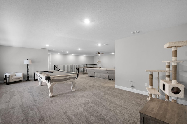 4485 Renly Ln, Clermont, FL 34711 - playroom featuring carpet flooring, recessed lighting, ceiling fan, and a textured ceiling
