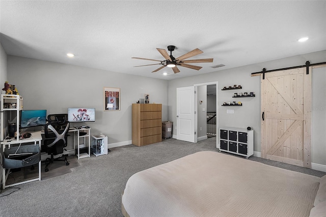 4485 Renly Ln, Clermont, FL 34711 - bedroom with a barn door, recessed lighting, a desk, carpet, and a ceiling fan