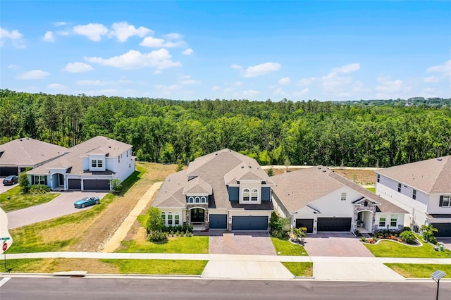 4485 Renly Ln, Clermont, FL 34711 - aerial perspective of suburban area featuring a heavily wooded area