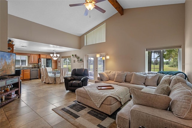 2710 Alabaster Ave, Orlando, FL 32833 - living room featuring plenty of natural light, light tile patterned floors, beam ceiling, high vaulted ceiling, and ceiling fan with notable chandelier