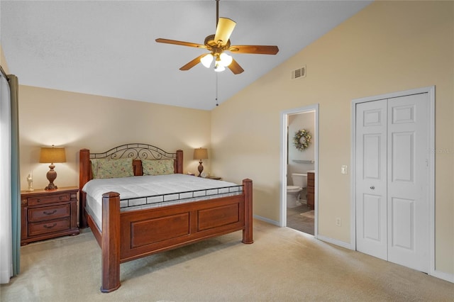 2710 Alabaster Ave, Orlando, FL 32833 - bedroom featuring vaulted ceiling, connected bathroom, light carpet, baseboards, and visible vents