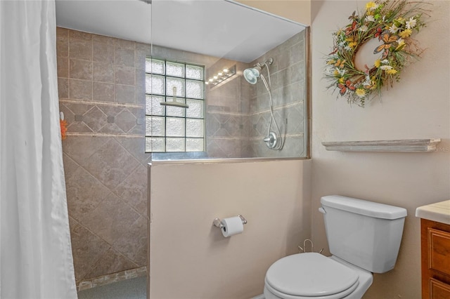 2710 Alabaster Ave, Orlando, FL 32833 - bathroom featuring toilet, vanity, and tiled shower