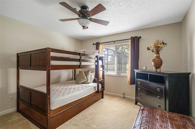2710 Alabaster Ave, Orlando, FL 32833 - carpeted bedroom with a textured ceiling, baseboards, and ceiling fan