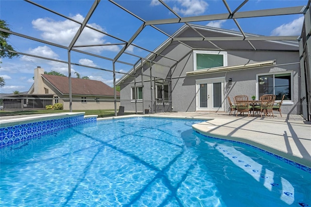 2710 Alabaster Ave, Orlando, FL 32833 - pool with a patio area, french doors, and glass enclosure