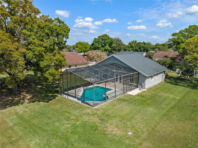 2710 Alabaster Ave, Orlando, FL 32833 - outdoor pool with a lawn, a lanai, and a patio