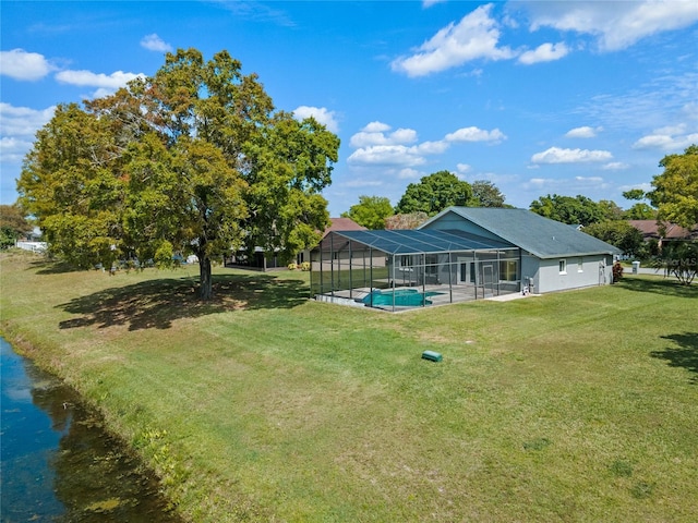 2710 Alabaster Ave, Orlando, FL 32833 - view of yard featuring a lanai, an outdoor pool, and a patio