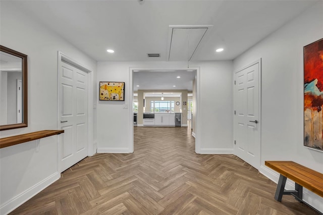 1003 Shore Dr, Kissimmee, FL 34744 - corridor featuring baseboards, attic access, and recessed lighting