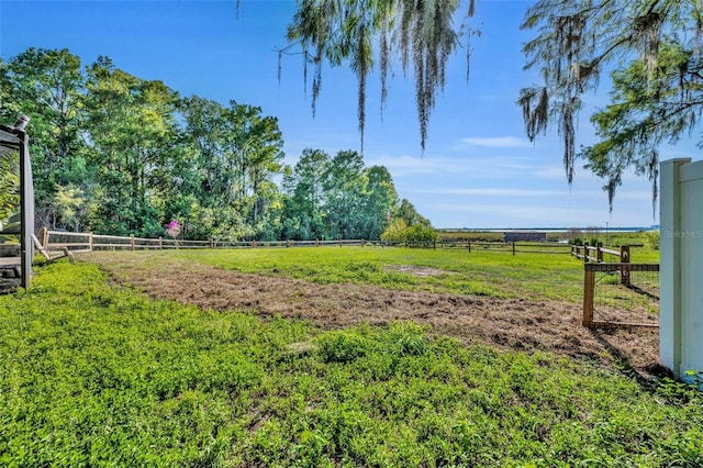 1003 Shore Dr, Kissimmee, FL 34744 - view of yard with fence and a rural view