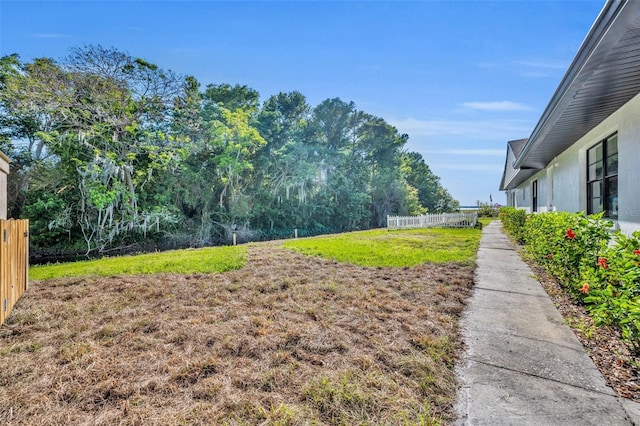 1003 Shore Dr, Kissimmee, FL 34744 - view of yard with fence