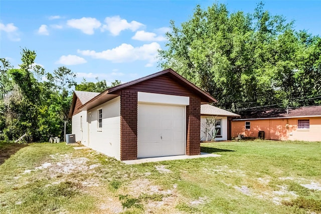 288 Howard Blvd, Longwood, FL 32750 - exterior space featuring a garage, central AC, brick siding, a shingled roof, and a lawn