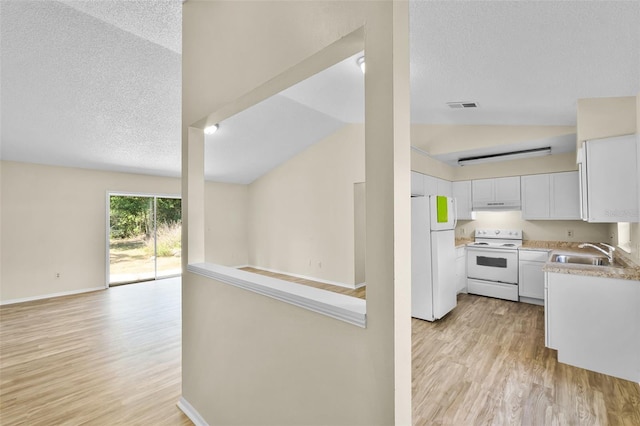 288 Howard Blvd, Longwood, FL 32750 - kitchen featuring visible vents, a sink, open floor plan, lofted ceiling, and white appliances