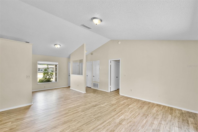 288 Howard Blvd, Longwood, FL 32750 - interior space with visible vents, lofted ceiling, and light wood finished floors