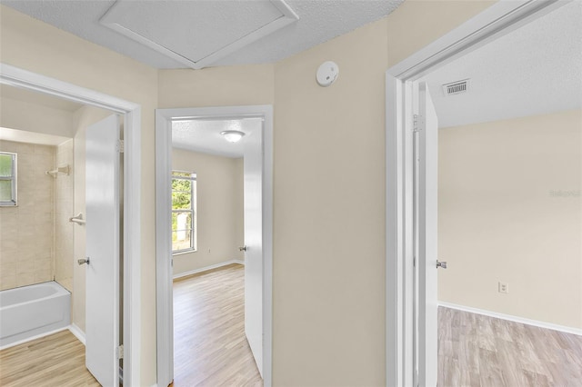 288 Howard Blvd, Longwood, FL 32750 - hall featuring baseboards, visible vents, and light wood-type flooring