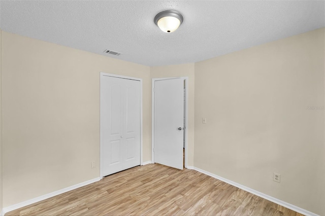 288 Howard Blvd, Longwood, FL 32750 - spare room with a textured ceiling, baseboards, visible vents, and light wood finished floors