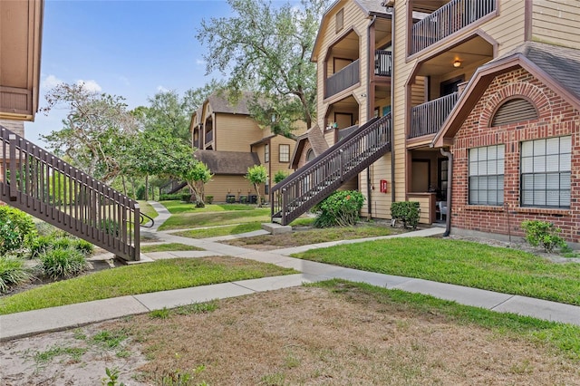390 Lake Placid Ct Unit 304, Altamonte Springs, FL 32701 - exterior space featuring a yard and stairs
