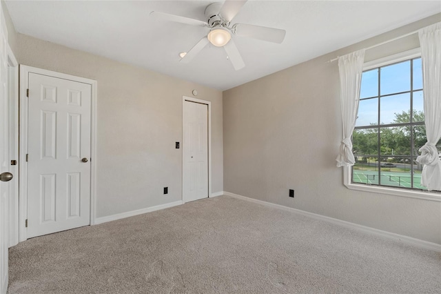 390 Lake Placid Ct Unit 304, Altamonte Springs, FL 32701 - unfurnished bedroom featuring carpet flooring, baseboards, and a ceiling fan