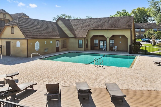 390 Lake Placid Ct Unit 304, Altamonte Springs, FL 32701 - community pool featuring a patio and fence