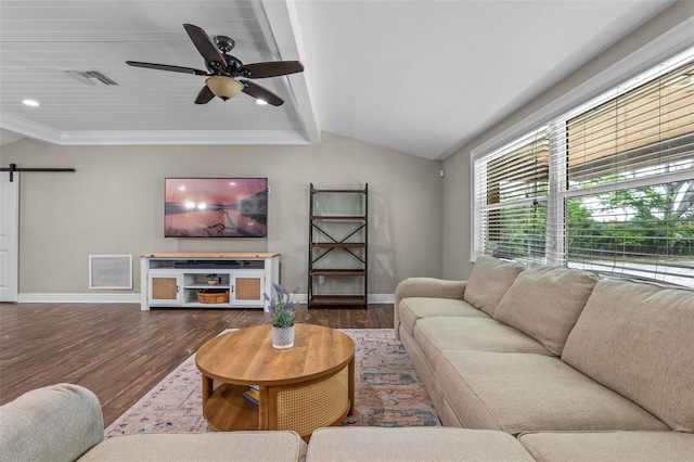 living room with a barn door, baseboards, vaulted ceiling with beams, and visible vents