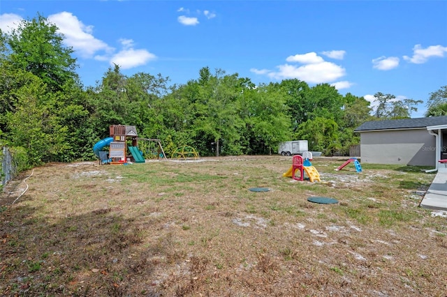 view of yard featuring a playground