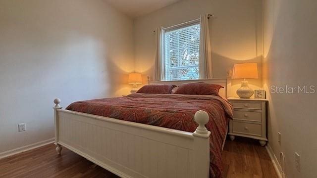 7415 Devereaux St, Reunion, FL 34747 - bedroom with wood finished floors
