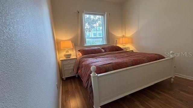 7415 Devereaux St, Reunion, FL 34747 - bedroom with wood finished floors