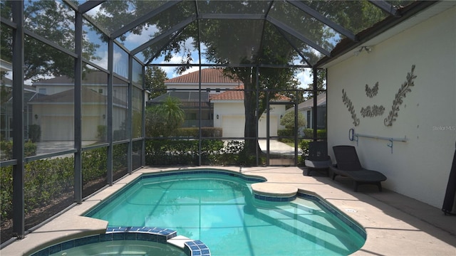 7415 Devereaux St, Reunion, FL 34747 - view of pool featuring a lanai, a pool with connected hot tub, and a patio area