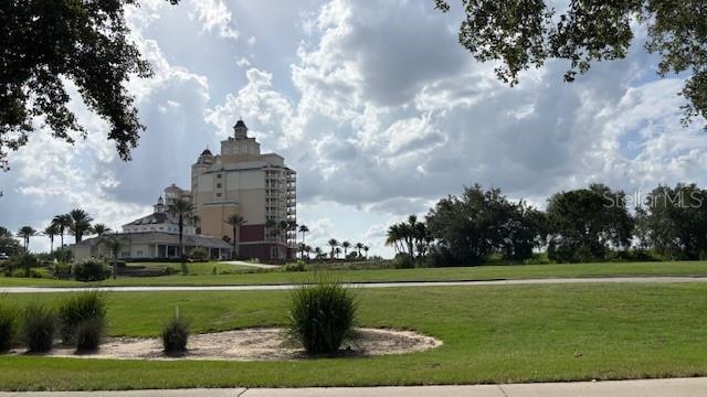 7415 Devereaux St, Reunion, FL 34747 - view of property's community featuring a lawn