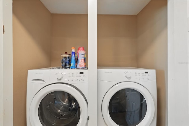 laundry area featuring separate washer and dryer