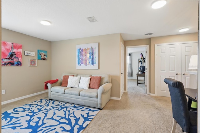 living room with light carpet and baseboards