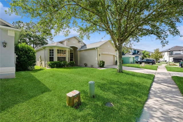 14208 Morning Frost Dr, Orlando, FL 32828 - single story home featuring an attached garage, concrete driveway, stucco siding, and a front yard