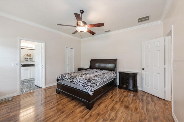 14208 Morning Frost Dr, Orlando, FL 32828 - bedroom featuring crown molding, visible vents, and wood finished floors