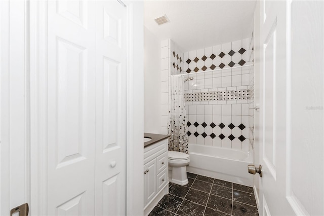 14208 Morning Frost Dr, Orlando, FL 32828 - bathroom featuring toilet, shower / bath combo with shower curtain, marble finish floor, vanity, and visible vents
