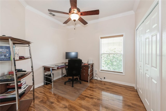 14208 Morning Frost Dr, Orlando, FL 32828 - office featuring wood finished floors, ornamental molding, visible vents, ceiling fan, and baseboards