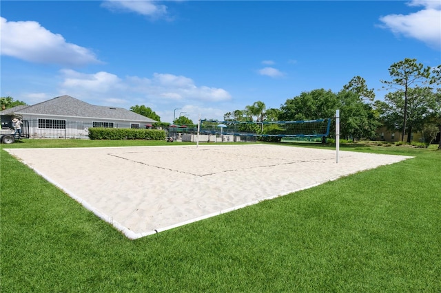 14208 Morning Frost Dr, Orlando, FL 32828 - view of community with a lawn and volleyball court