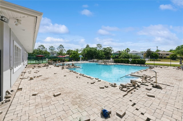 14208 Morning Frost Dr, Orlando, FL 32828 - community pool featuring fence and a patio