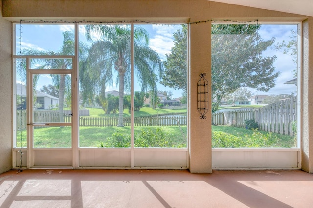 doorway to outside featuring a water view