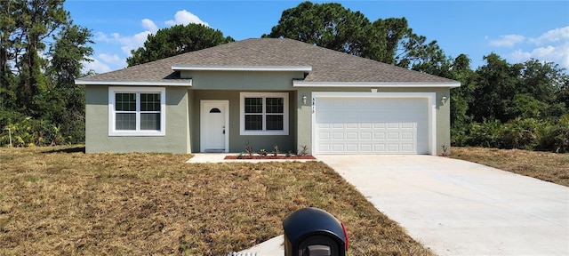 5815 Twisted Oaks Dr, Sebring, FL 33876 - ranch-style home with stucco siding, an attached garage, driveway, a front lawn, and roof with shingles