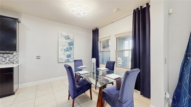 4002 Scarlet Branch Rd, Orlando, FL 32824 - dining space with baseboards and light tile patterned flooring