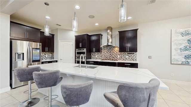 4002 Scarlet Branch Rd, Orlando, FL 32824 - kitchen with light tile patterned floors, stainless steel appliances, wall chimney exhaust hood, and a sink