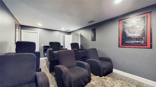 4002 Scarlet Branch Rd, Orlando, FL 32824 - cinema room featuring visible vents, recessed lighting, baseboards, and wood finished floors