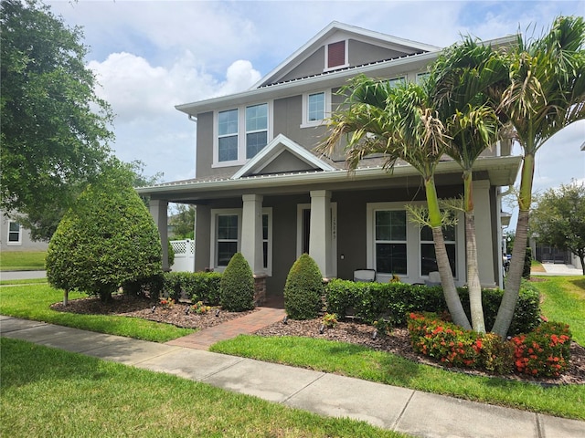15849 Sweet Lemon Way, Winter Garden, FL 34787 - view of front of home with a porch, stucco siding, and a front yard