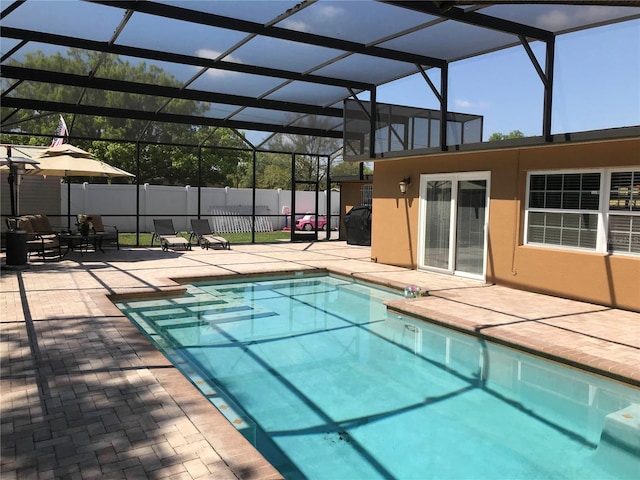 4251 Anthony Ln, Orlando, FL 32822 - view of swimming pool with fence, a patio area, a lanai, and a fenced in pool