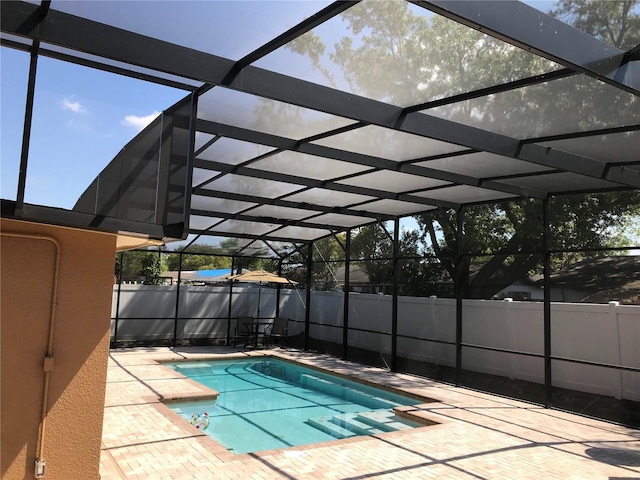 4251 Anthony Ln, Orlando, FL 32822 - view of swimming pool with a lanai, fence, a patio area, and a fenced in pool