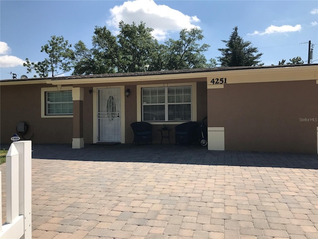 4251 Anthony Ln, Orlando, FL 32822 - view of front of home featuring stucco siding