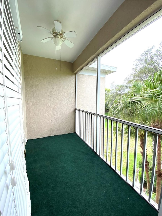 balcony with a ceiling fan