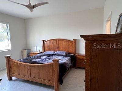 5060 Arancia Ln, Ave Maria, FL 34142 - bedroom featuring a ceiling fan and light tile patterned flooring