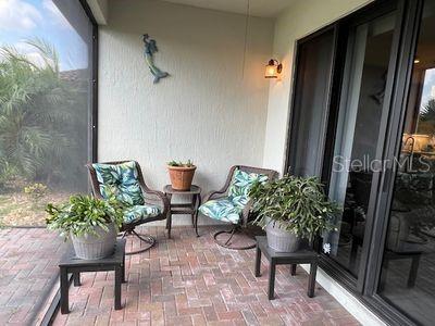 5060 Arancia Ln, Ave Maria, FL 34142 - balcony featuring a patio